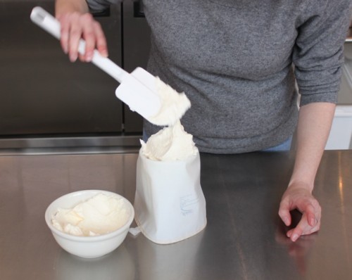 Fill the piping bag about yea high. 