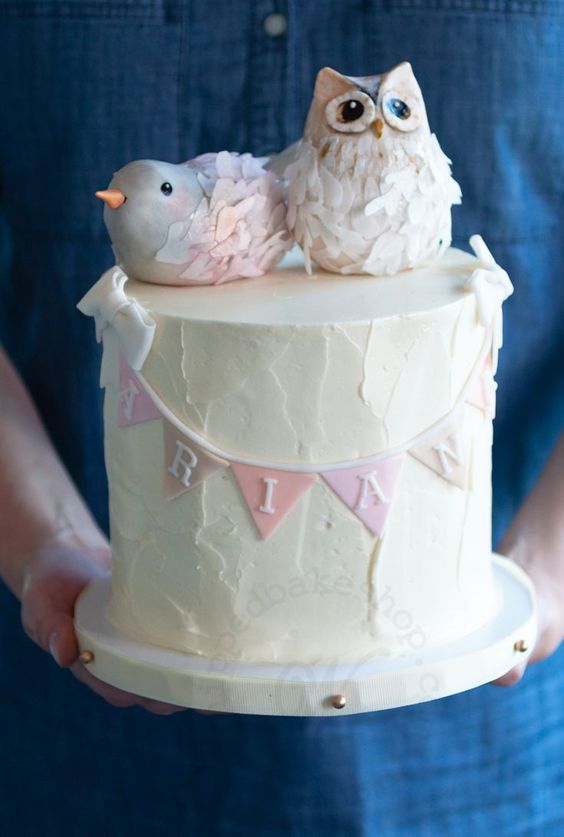 Cake with two owl toppers by whipped bakeshop
